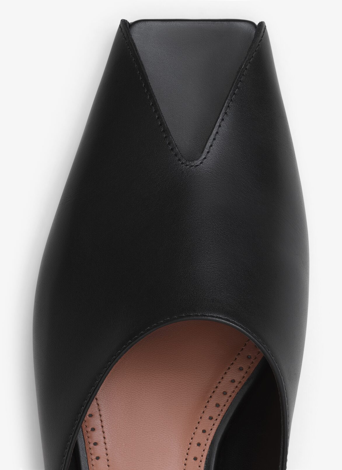 MULE SPIKE FLAT IN PELLE DI VITELLO ALAÏA MULE SPIKE FLAT IN PELLE DI VITELLO NERO